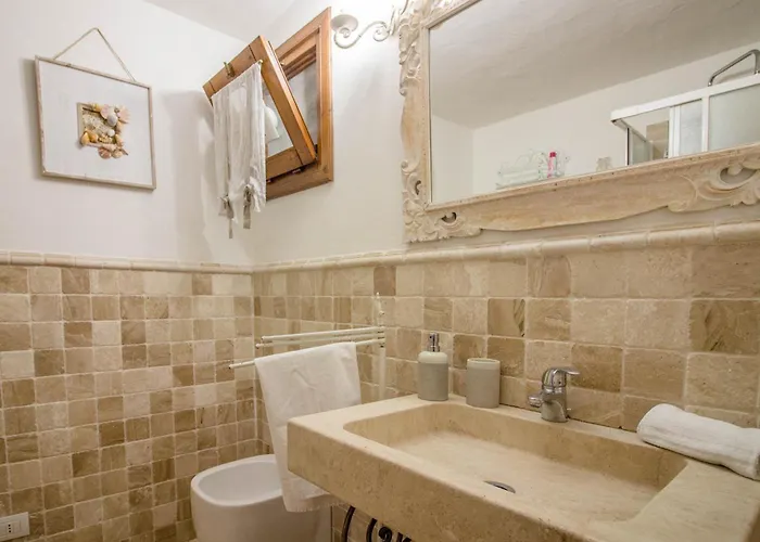 Guesthost - Sea View Apartment With Veranda! Golfo Aranci